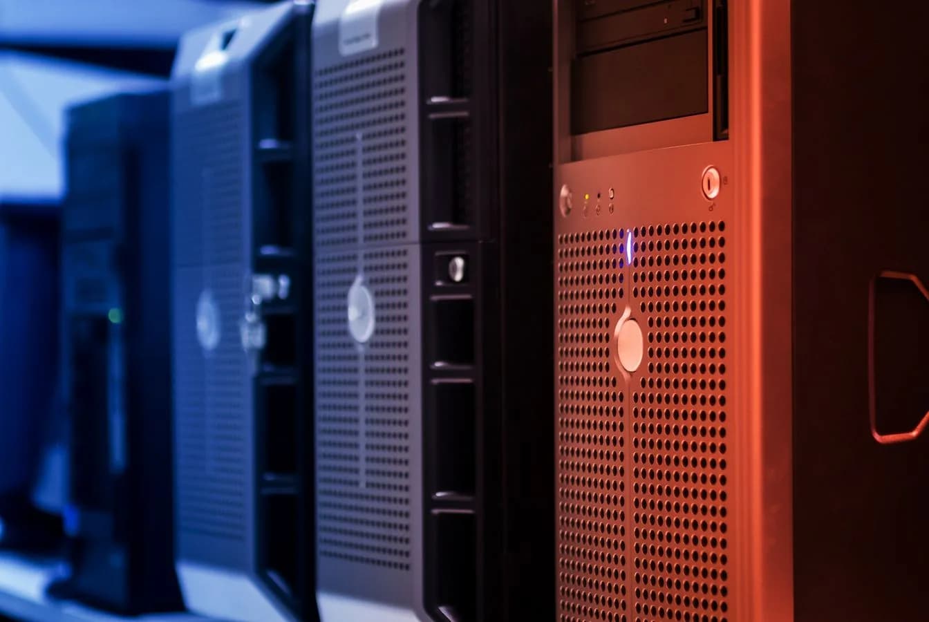 Server tower racks in a data center, the kind of VPS an onchain AI agent runs on. Photo by panumas nikhomkhai on Pexels.