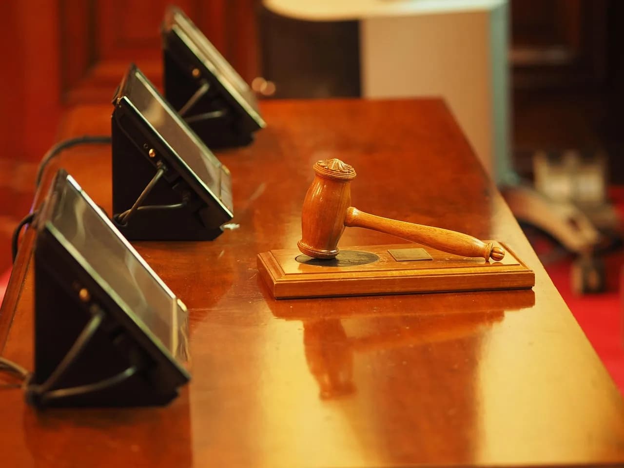 Judge's gavel on a desk representing legislative deadlock over the CLARITY Act