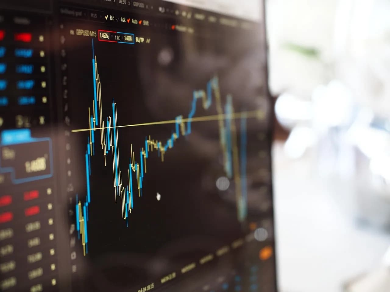 Stock market decline chart showing losses on a screen