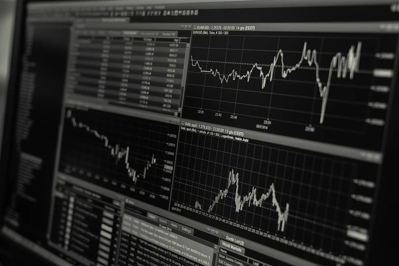 Financial data displays representing the wave of digital asset firms seeking federal bank charters