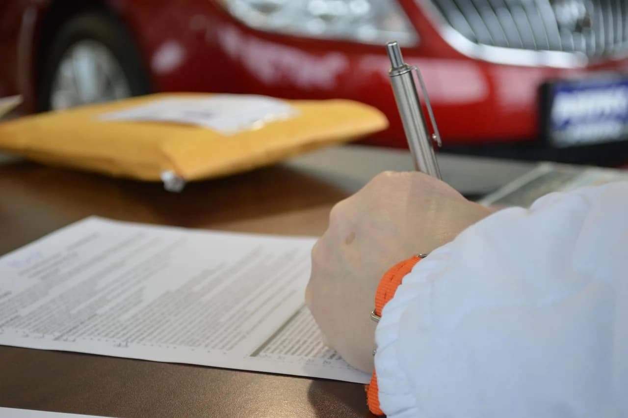 Legal contract and document signing representing federal interpretive guidance on crypto asset classification