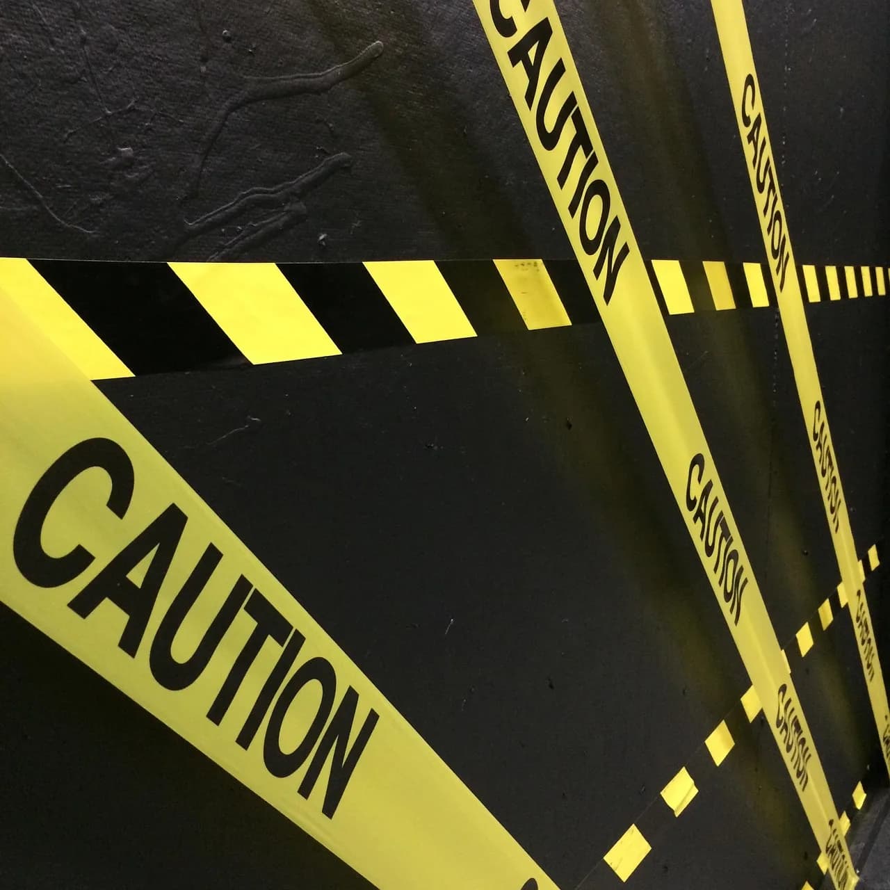 Yellow caution tape stretched across a site, representing the guardrails an X automation agent needs before it goes live. Photo by Lindsay_Jayne on Pixabay.